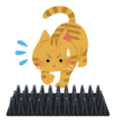 イラスト：ねこがとげを嫌がる様子