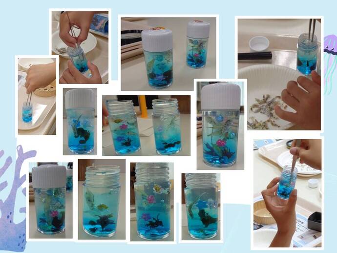 チリメンモンスターを使ったミニ水族館を作成している様子の写真。